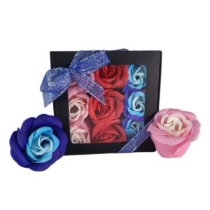 Boite noire de 9 roses de savon alignées rose tricolore rouge et bleu tricolore